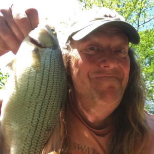 Crappie Hippie catches a white bass on a lead free Crappie Dueller by Glasswater Angling