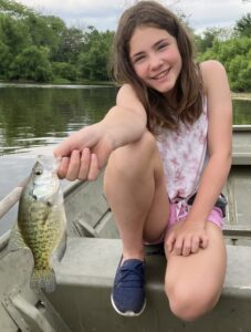 Cadence with a crappie caught on lead free tackle